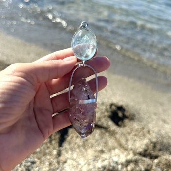 Big Aquarium with magical double terminated Brandenberg Amethyst