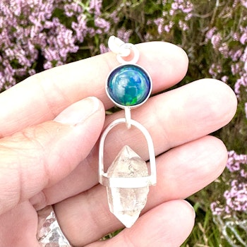 Dragons eye- black opal with double terminated clear quartz.