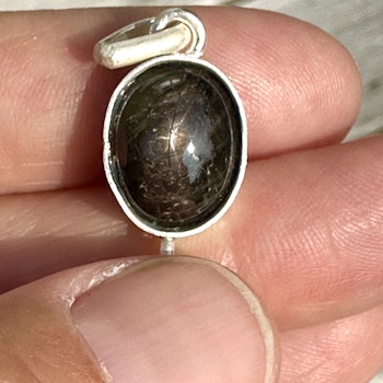 Star Diopside “Black Star” with silver Rutilated Quartz.