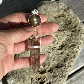 Raa- bringer of the light. Star sunstone with Smokey citrine Vogel.   Masterpiece