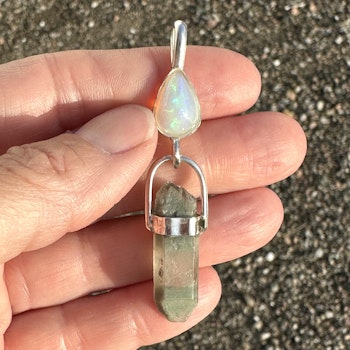 Velo Opal with double terminated Lodolite from Norway.
