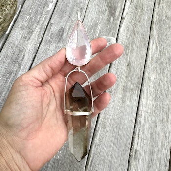 Cosmic love, embodying the Dragon energy and love through the field. Rose quartz with double terminated Lodolite