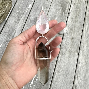 Cosmic love, embodying the Dragon energy and love through the field. Rose quartz with double terminated Lodolite