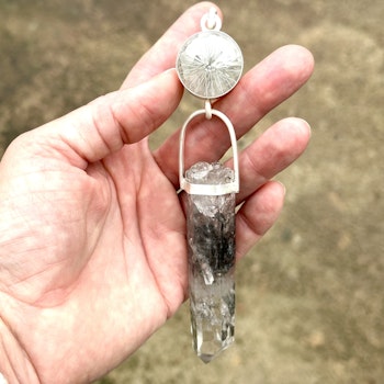 Clear Quartz  with Clear Quartz with amazing incisions from the Himalayas