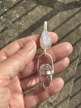 Athena and the white dragon- Rainbow moonstone with Clear Quartz Dragon egg.
