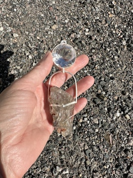 Silver wolf light portal- clear Quartz with amazing Rutilated Quartz with a raw side.