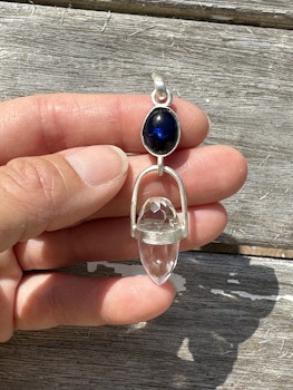 Dragon egg of the Cosmic Womb and the oceans of abundant magic- Black opal with clear Quartz Dragon egg.