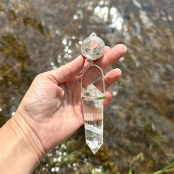 Portal of divine light of the Pleiades, Masterpiece- clear Quartz with 24 sided Vogel crystal.