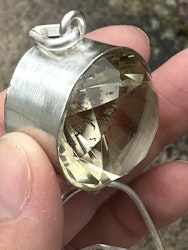 Dragon of life giving and light giving- Dark citrine with magical inclusions with clear Quartz dragon egg with massive rainbows.
