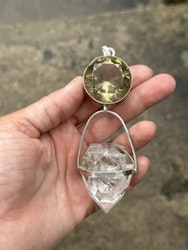 Dragon of life giving and light giving- Dark citrine with magical inclusions with clear Quartz dragon egg with massive rainbows.