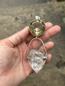 Dragon of life giving and light giving- Dark citrine with magical inclusions with clear Quartz dragon egg with massive rainbows.