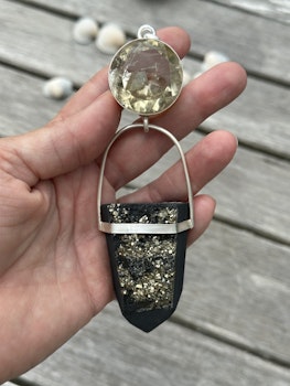 New Golden age- Citrine with Phyrite crystals of black stone