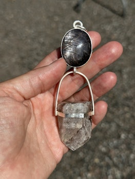 Star lovers- Double star Sapphire with white Lodolite Quartz Crystal   This is an amazing piece with two very special crystals.  I see two celestial bodies moving together, longing to reach each other
