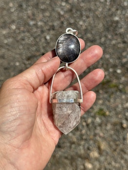 Star lovers- Double star Sapphire with white Lodolite Quartz Crystal   This is an amazing piece with two very special crystals.  I see two celestial bodies moving together, longing to reach each other