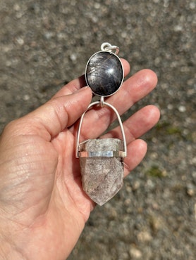 Star lovers- Double star Sapphire with white Lodolite Quartz Crystal   This is an amazing piece with two very special crystals.  I see two celestial bodies moving together, longing to reach each other