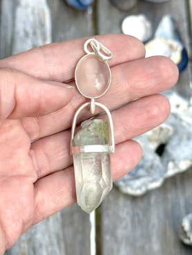 Natural moonstone (with cat eye effect) with light Lodolite