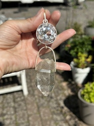 Light portal of the hidden lights of cosmos Clear Quartz light portal with  Enhydro Quartz from the Himalayas with moving sand/stardust in the water.