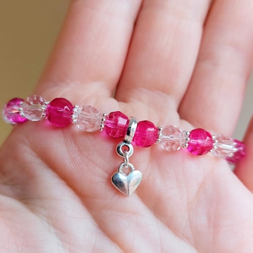 Barnarmband glas Rosa Bandet