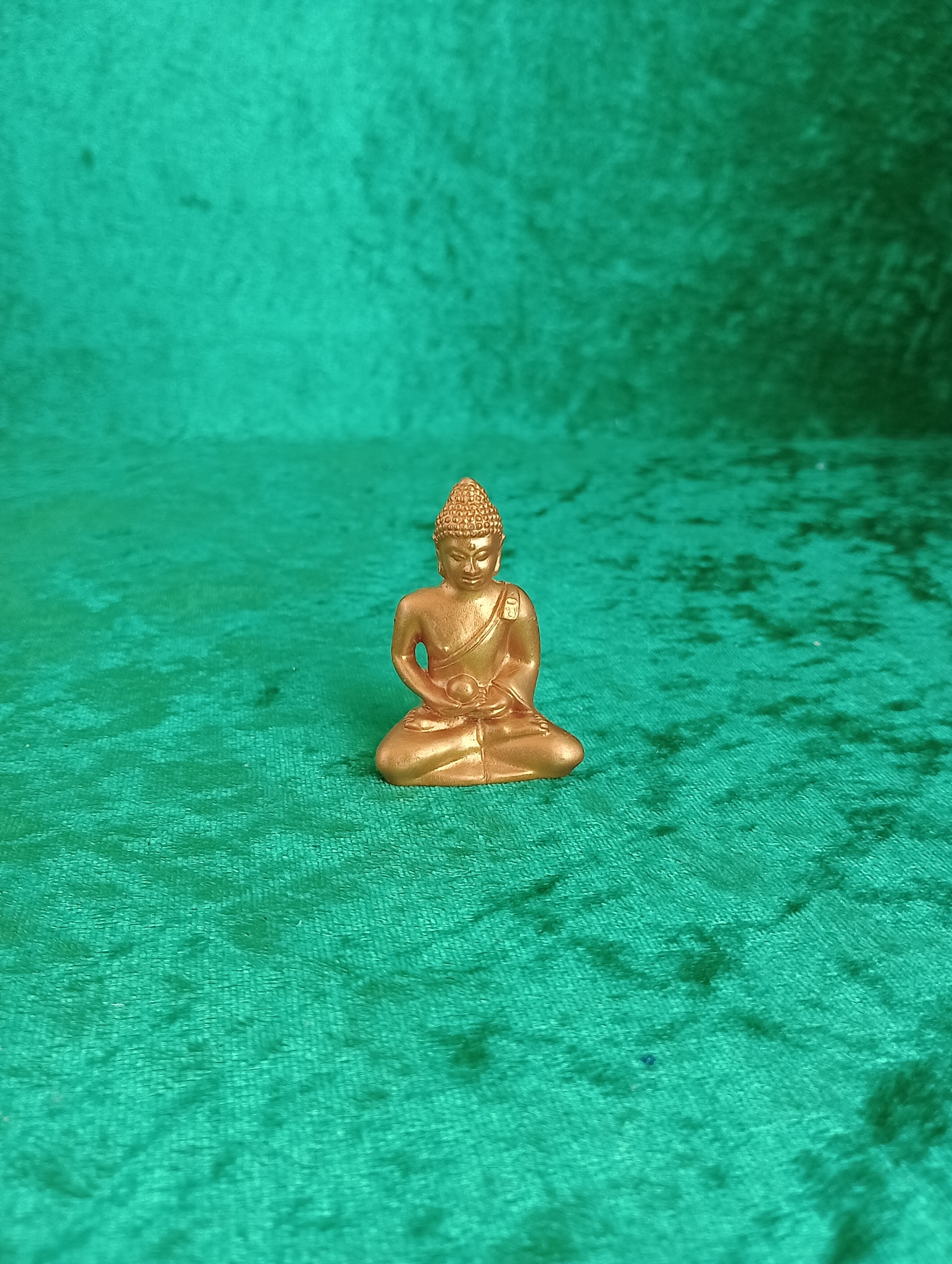 Guldig liten Buddha