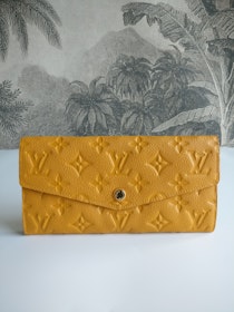 Louis Vuitton Empreinte Portefeuille Curieuse wallet