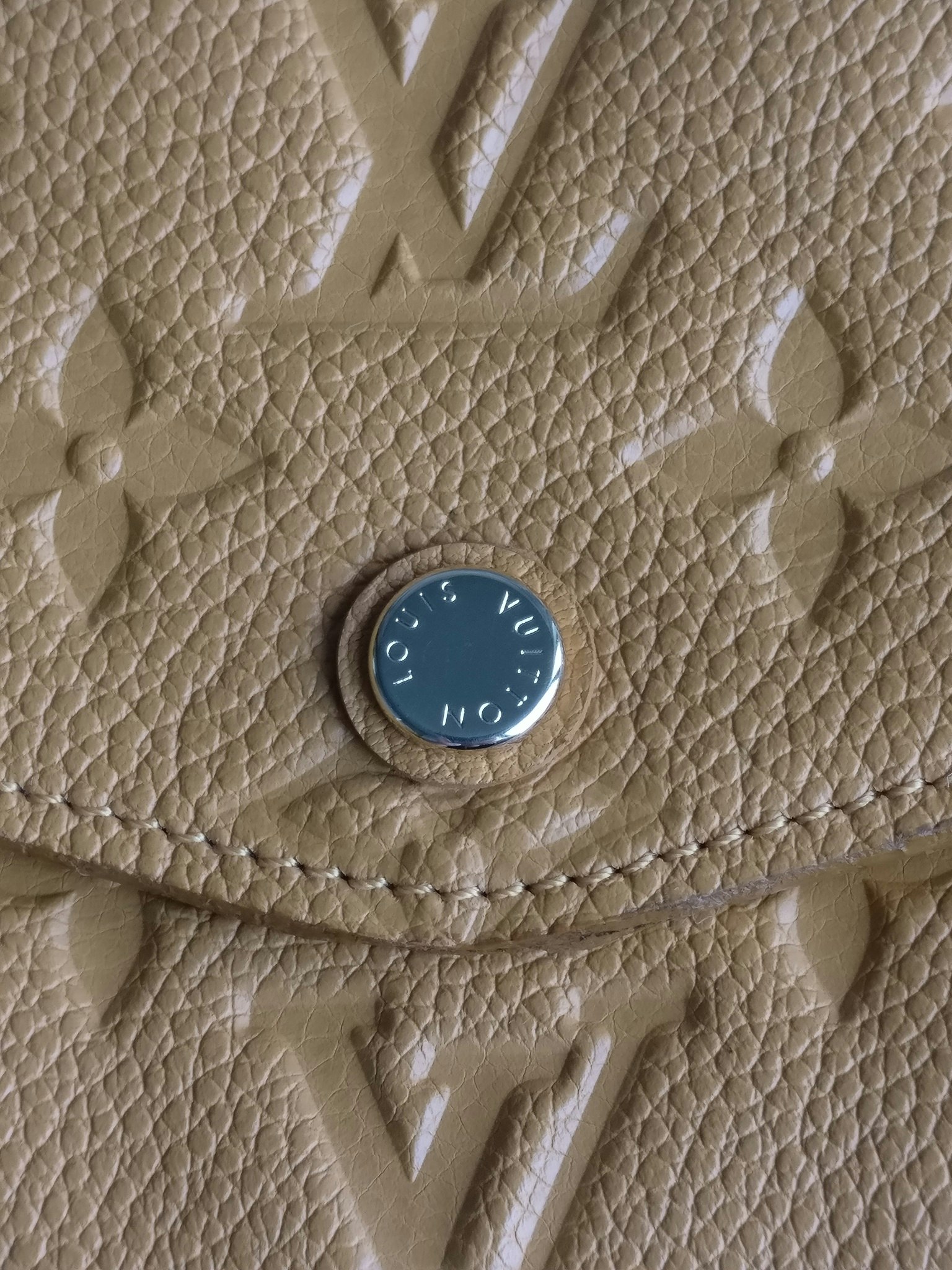 Louis Vuitton Empreinte Portefeuille Curieuse wallet