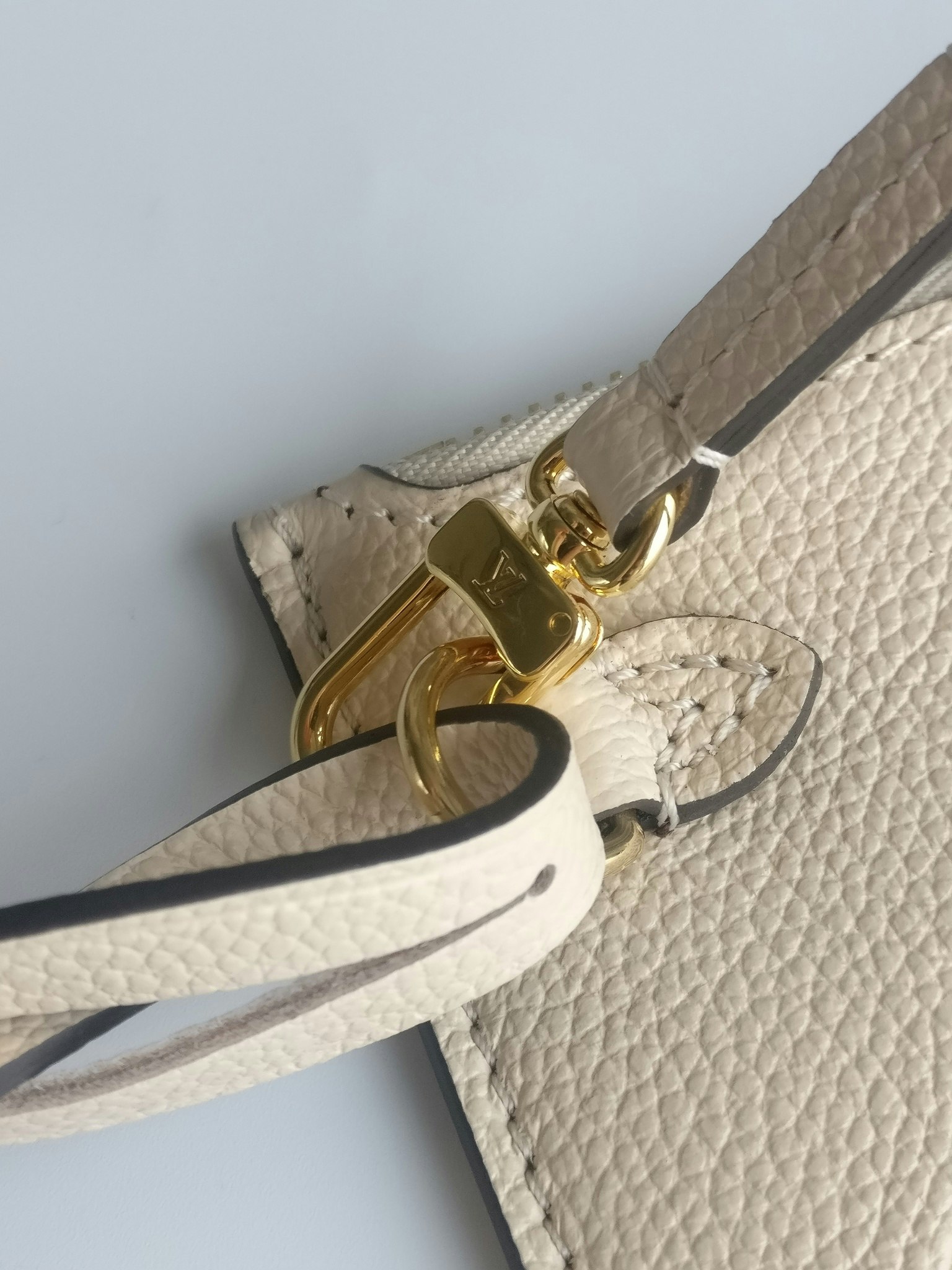 Louis Vuitton Neverfull empreinte clutch