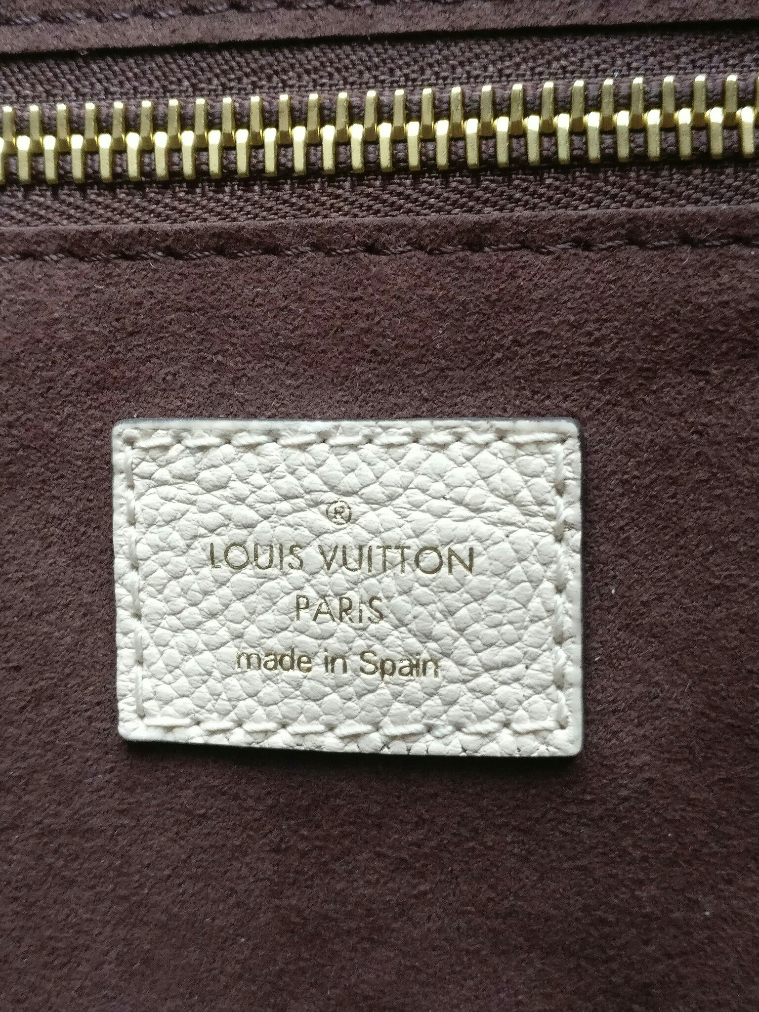 Louis Vuitton Neverfull MM empreinte crème