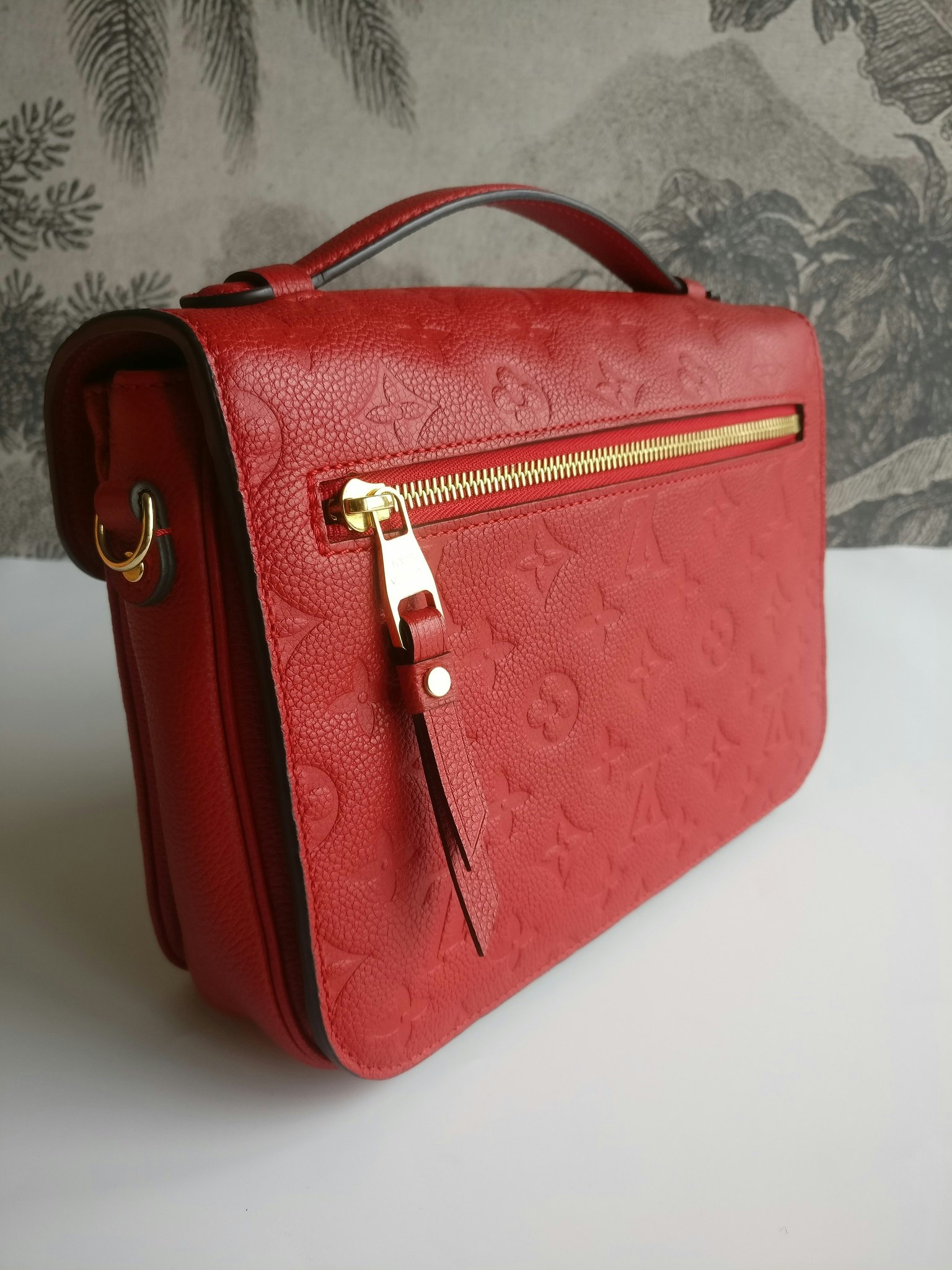 LOUIS VUITTON Empreinte Pochette Metis Cherry | FASHIONPHILE