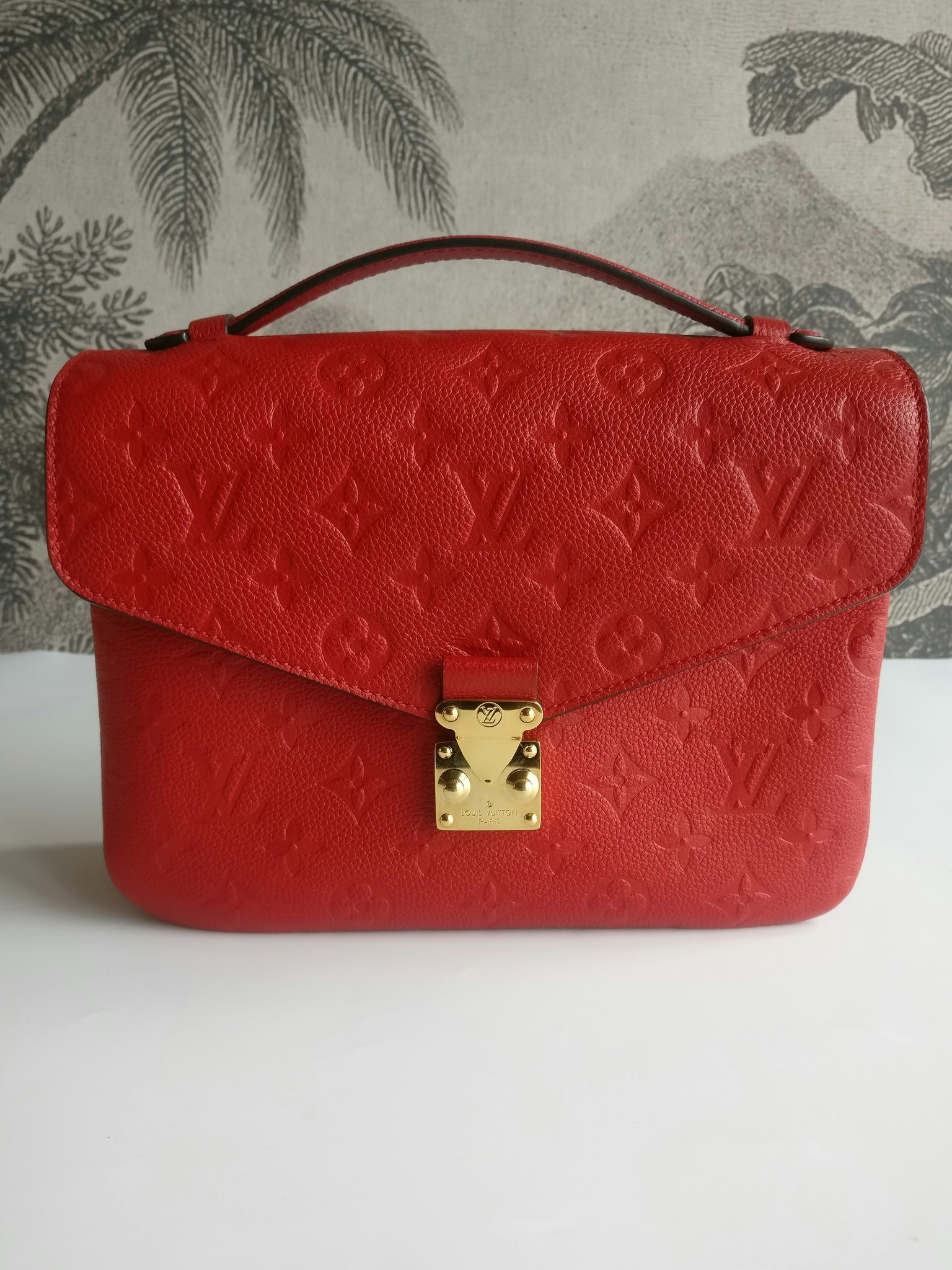 LOUIS VUITTON Empreinte Pochette Metis Cherry | FASHIONPHILE