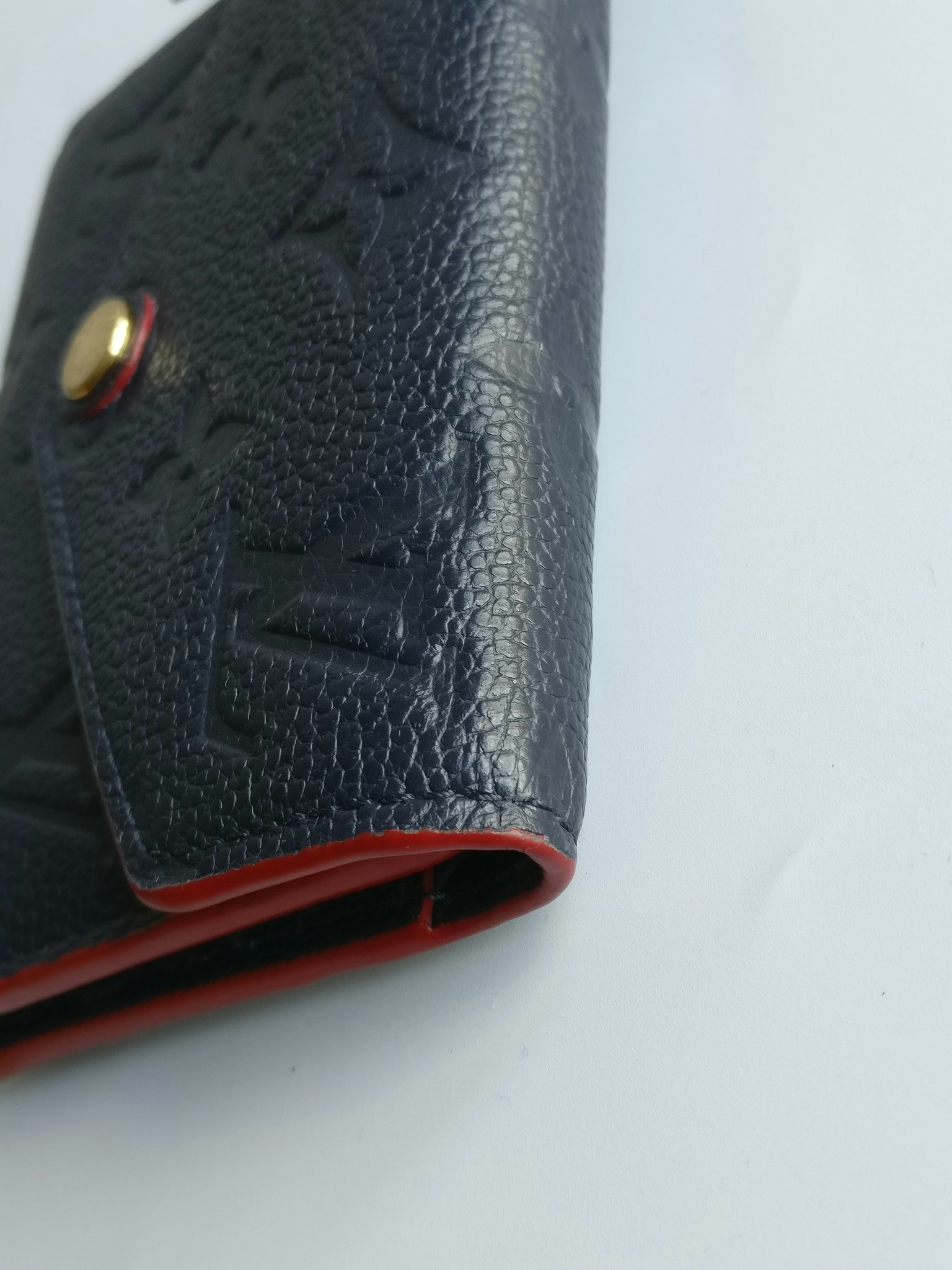 Louis Vuitton Victorine Wallet empreinte marine rouge