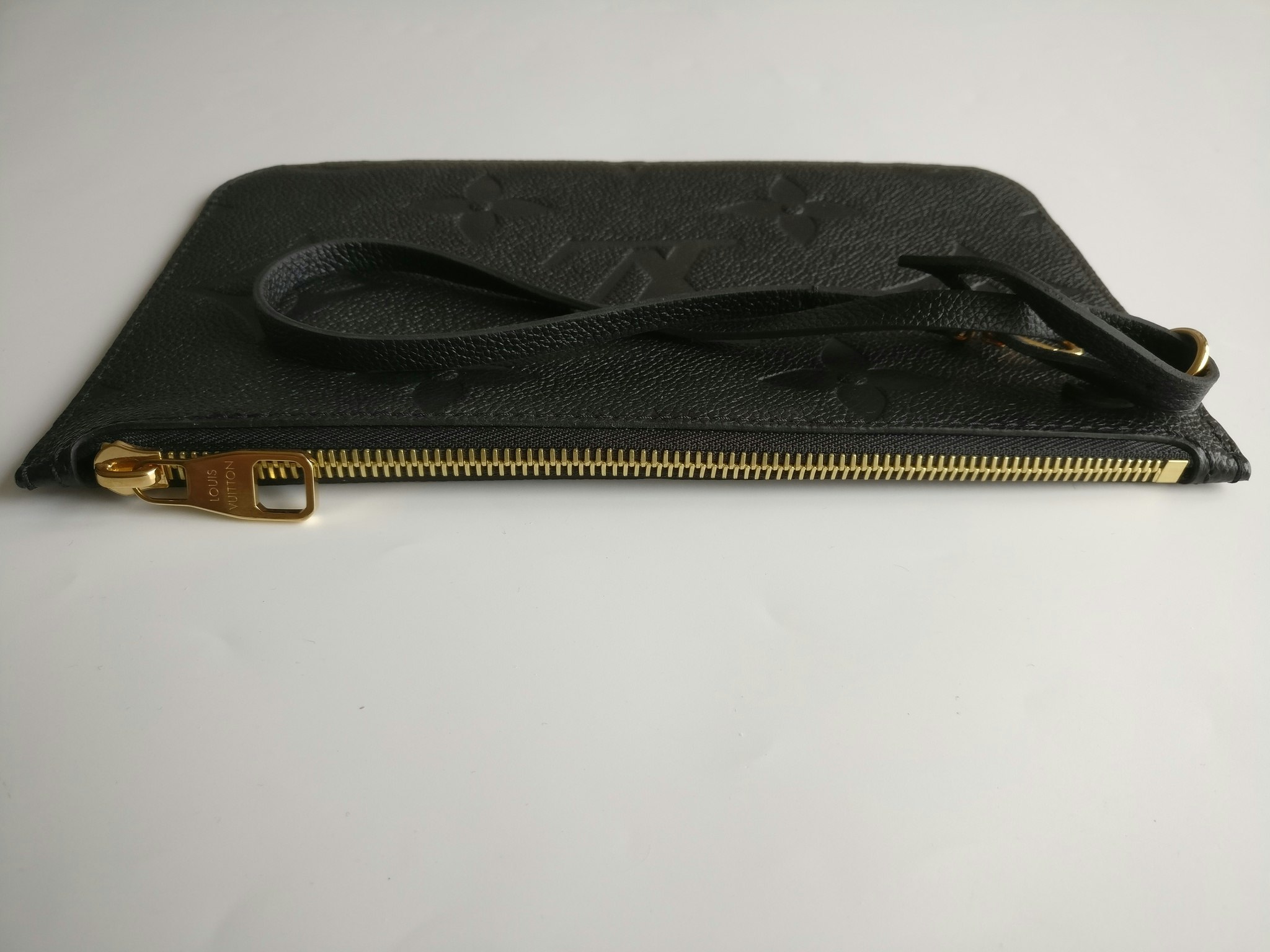 Louis Vuitton Neverfull empreinte clutch