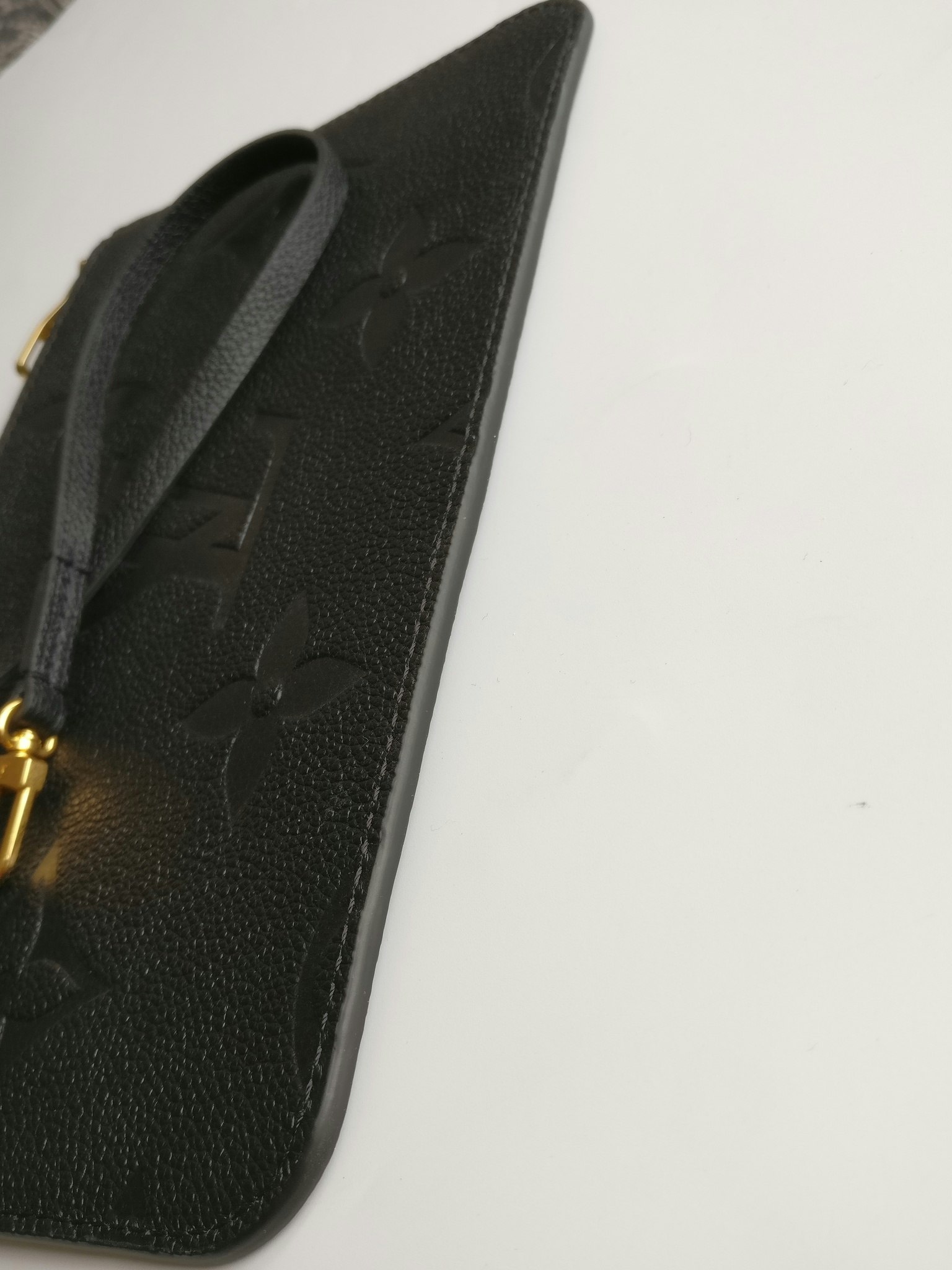 Louis Vuitton Neverfull empreinte clutch