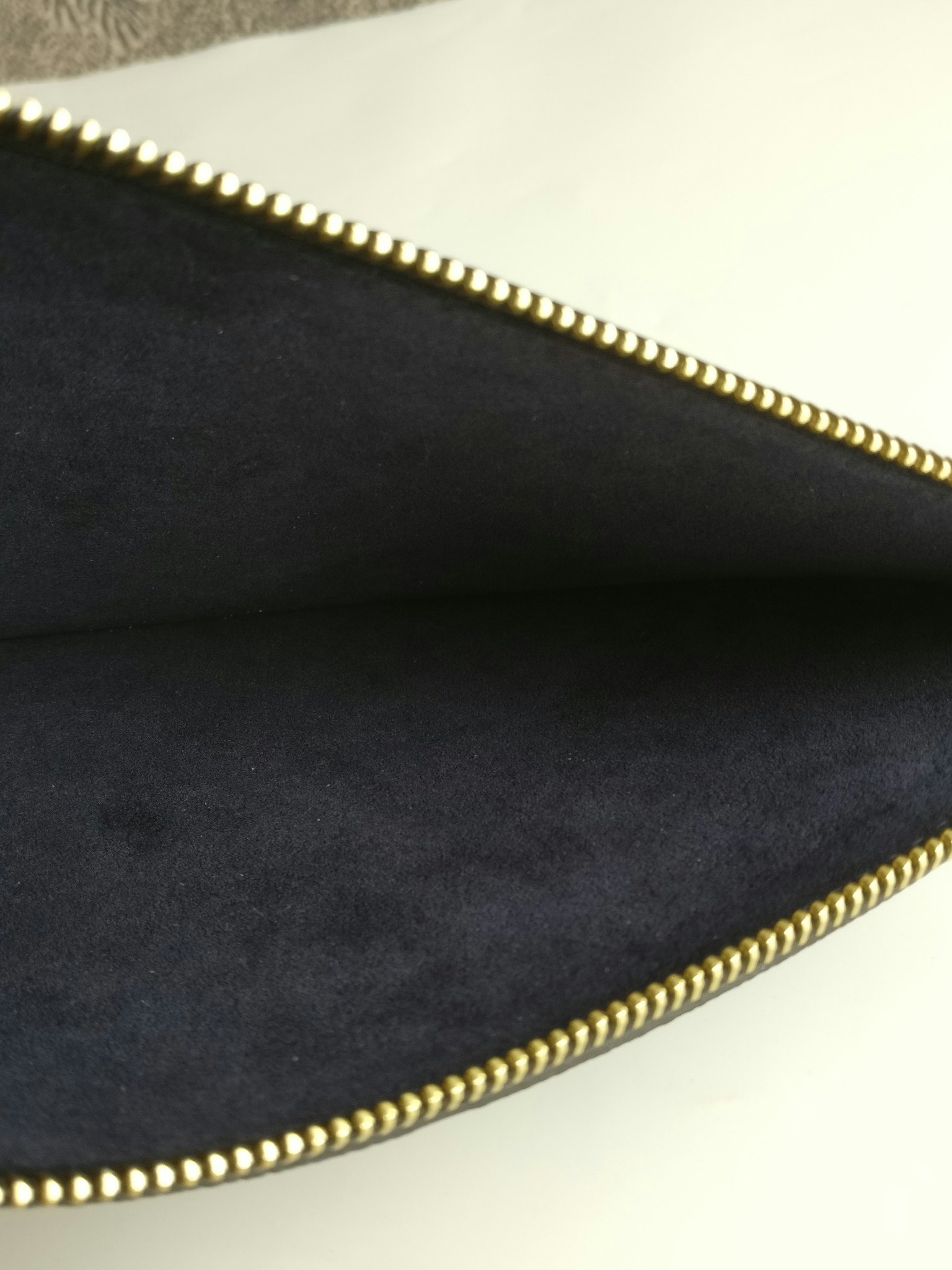 Louis Vuitton Neverfull empreinte clutch