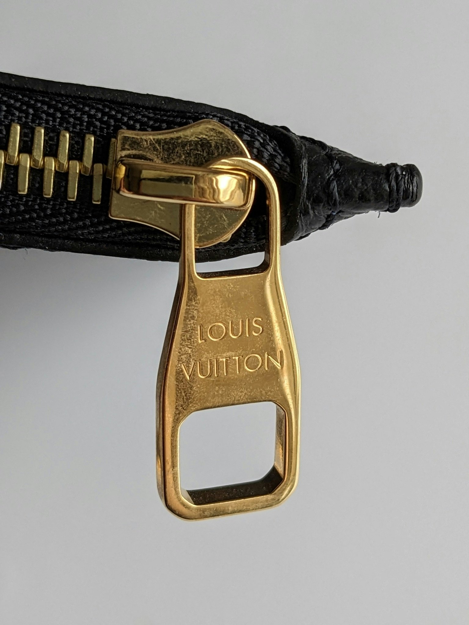Louis Vuitton Neverfull empreinte clutch
