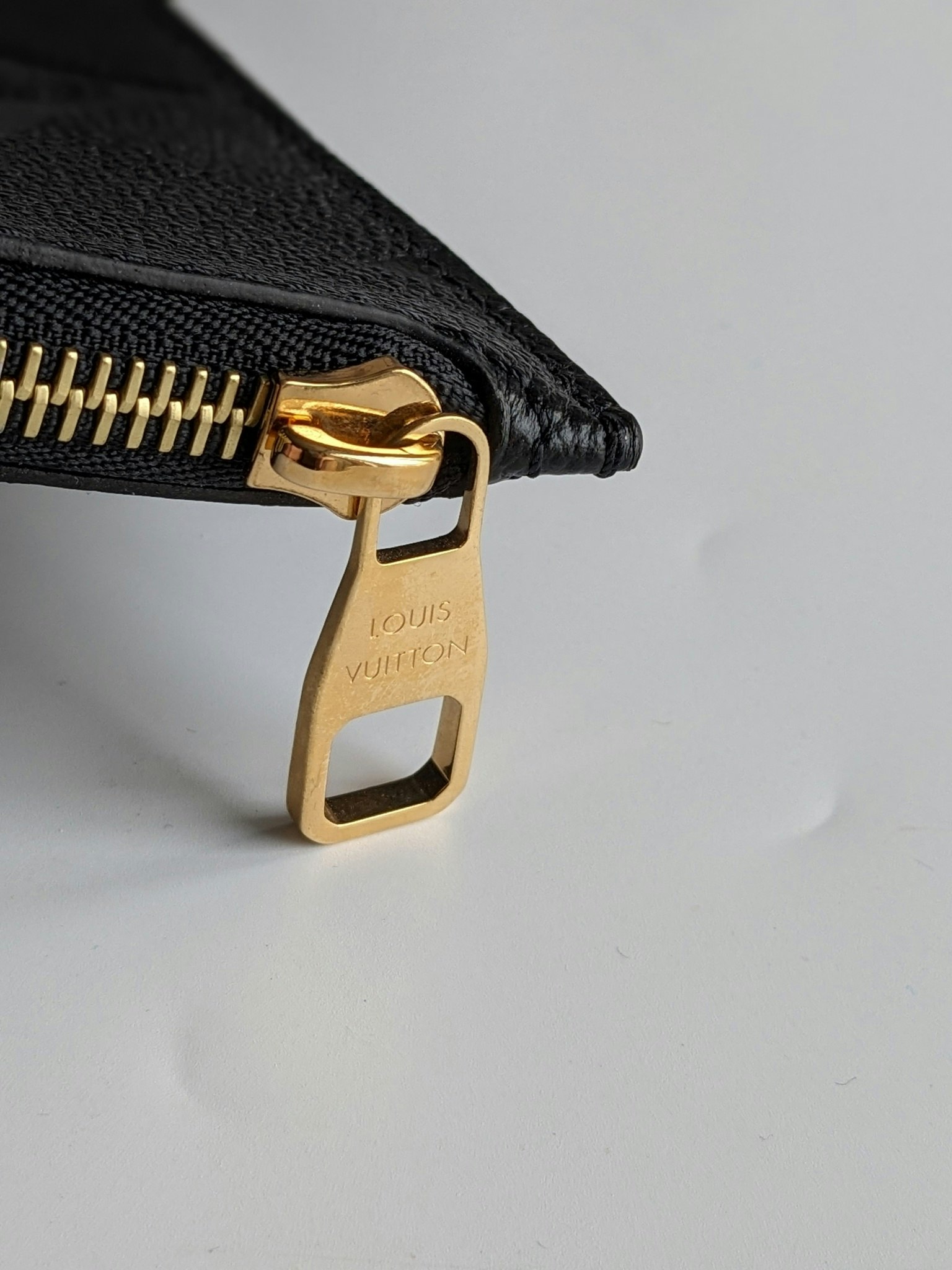 Louis Vuitton Neverfull empreinte clutch
