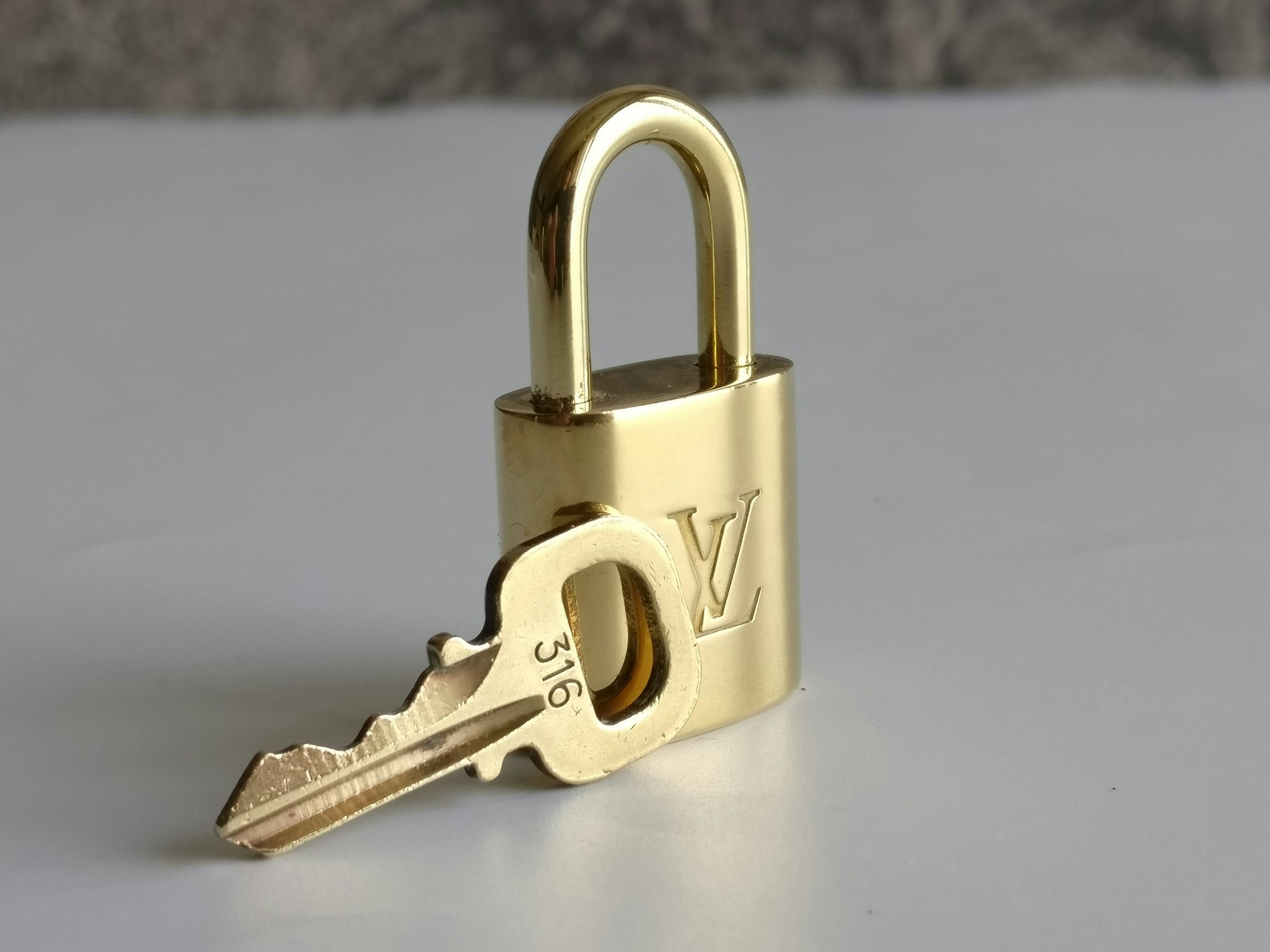 Louis Vuitton Padlock and key 316