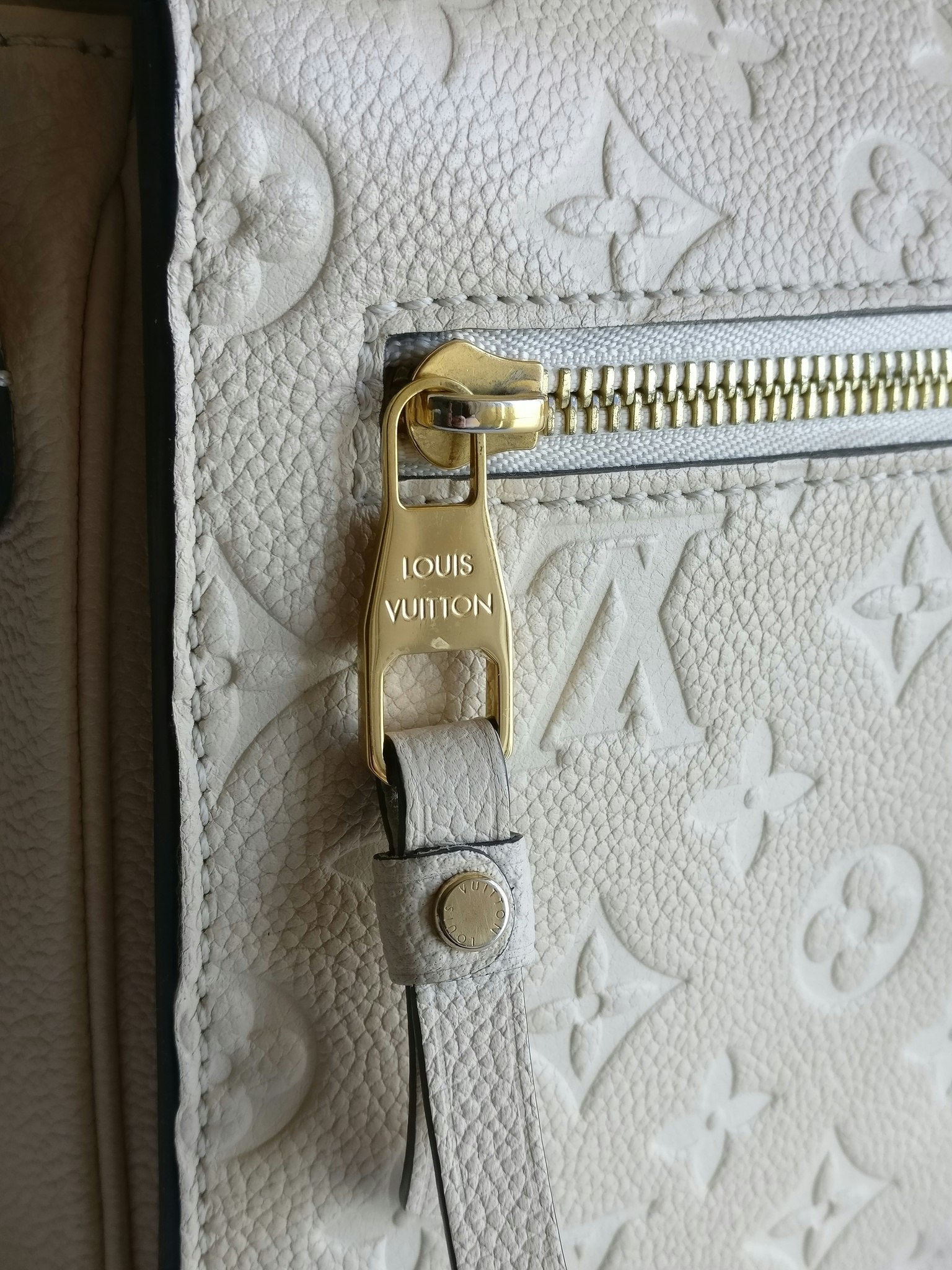 Louis Vuitton Pochette Metis empreinte