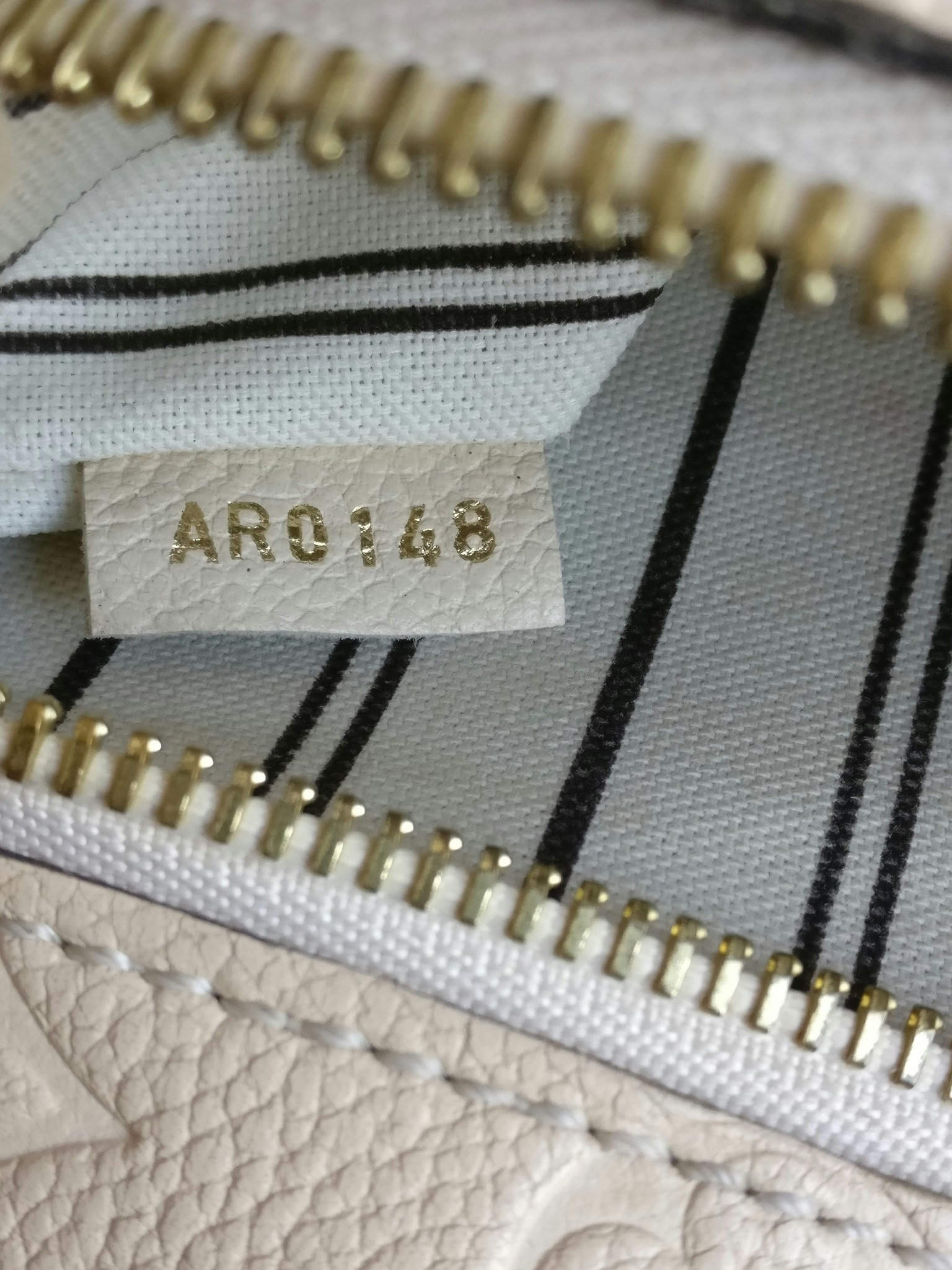 Louis Vuitton Pochette Metis empreinte
