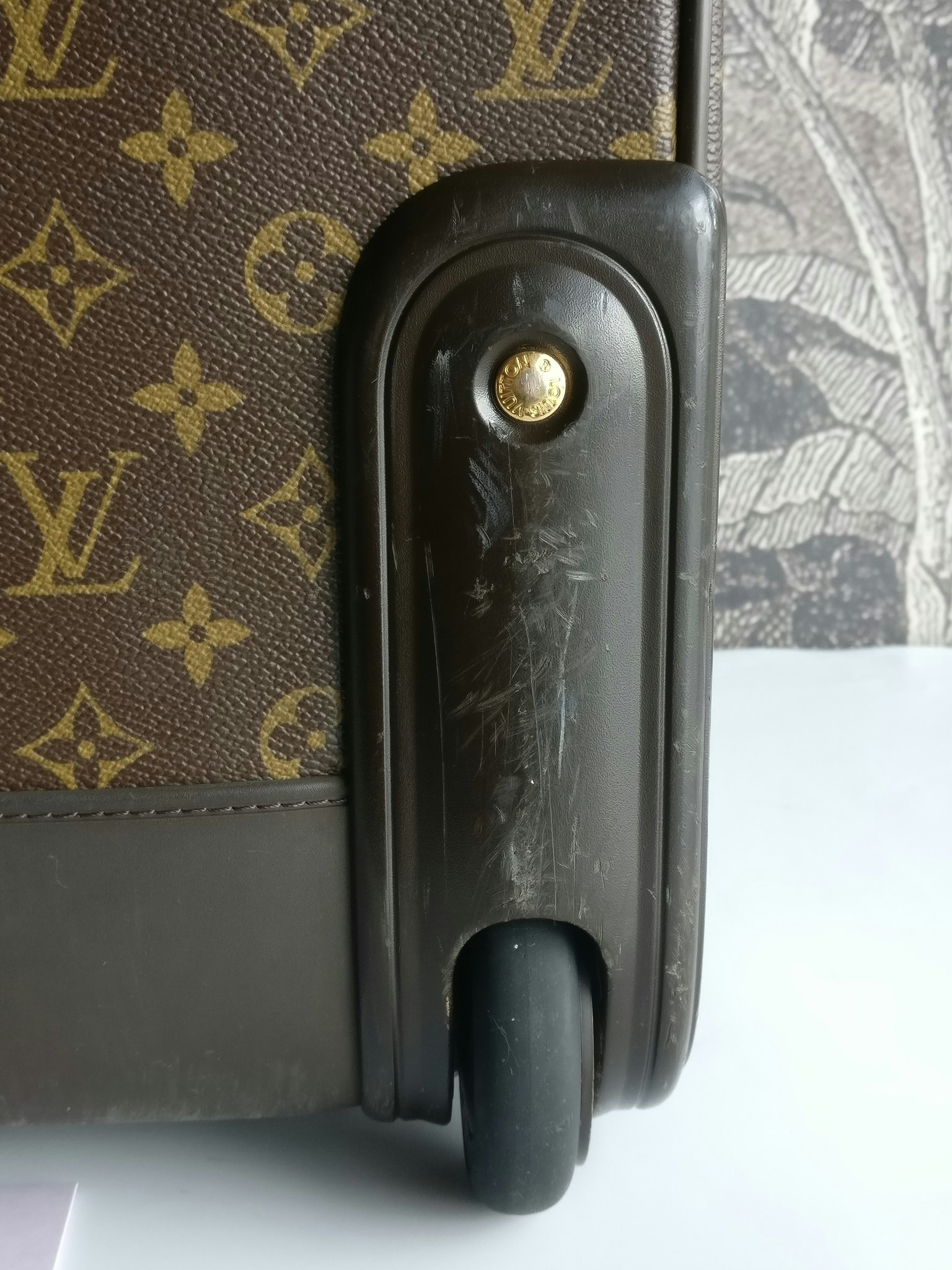 Louis Vuitton Pegase 55 with bag cover