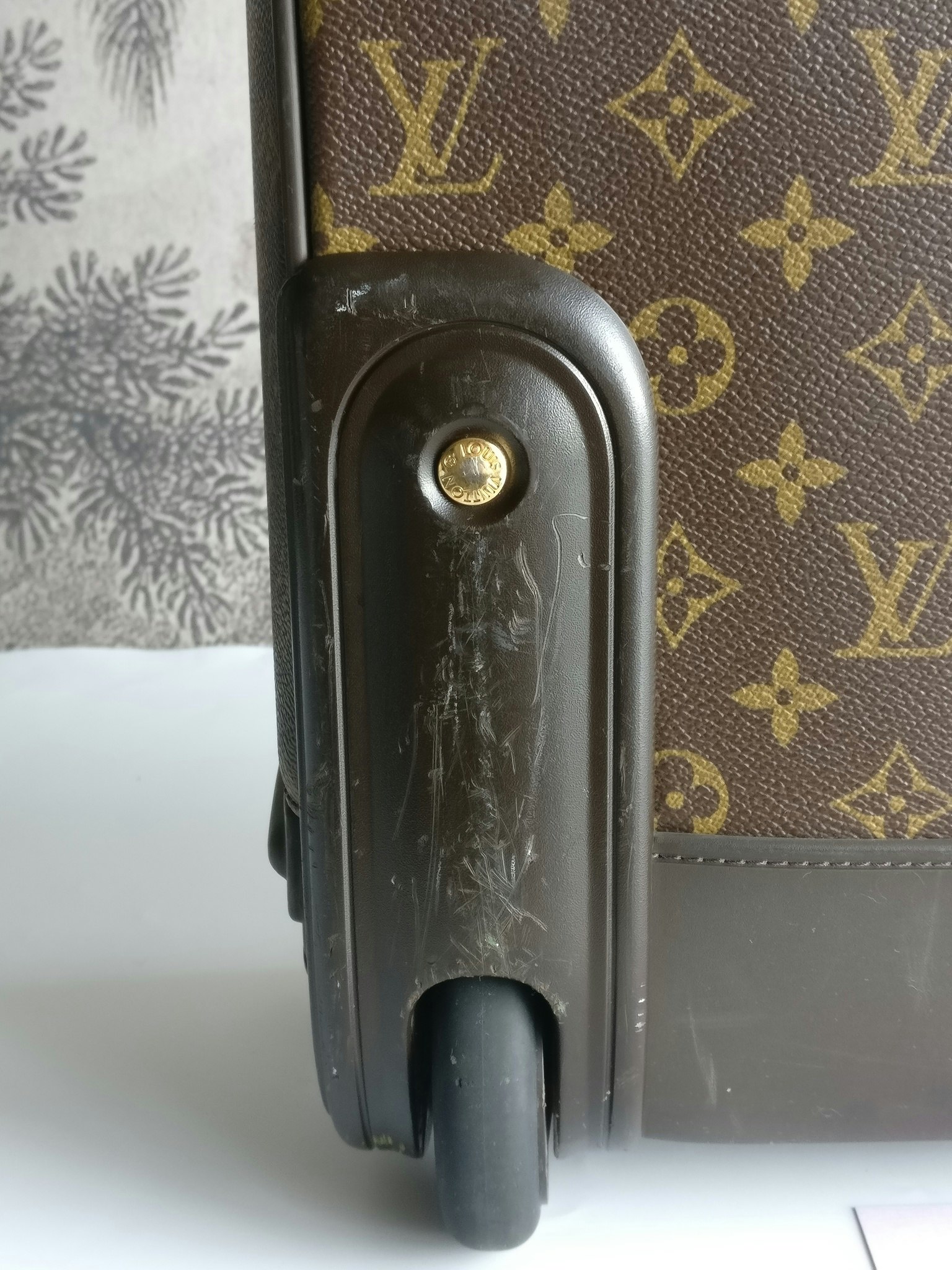 Louis Vuitton Pegase 55 with bag cover
