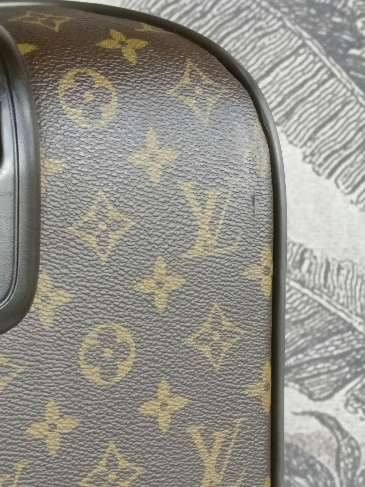 Louis Vuitton Pegase 55 with bag cover
