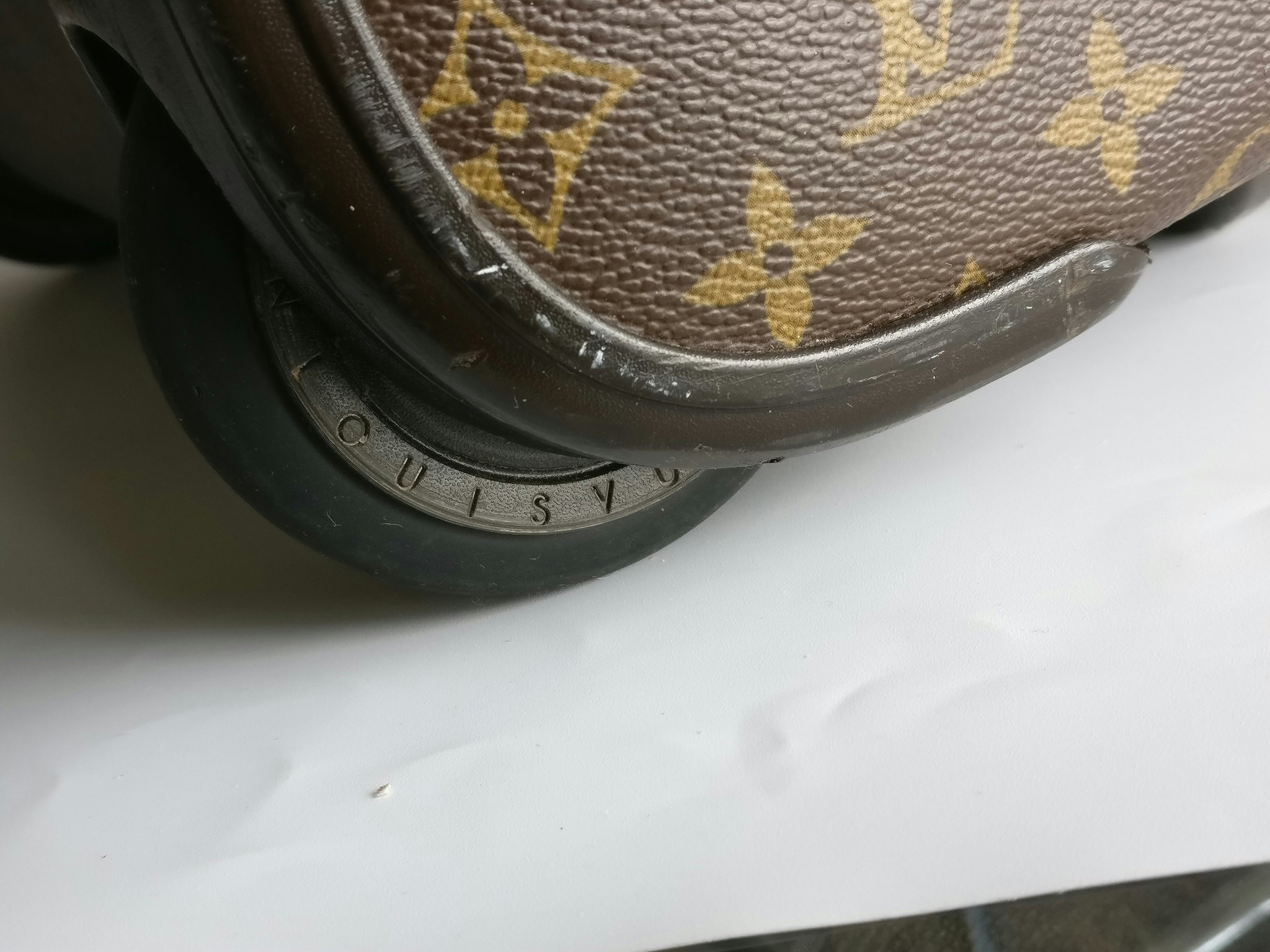 Louis Vuitton Pegase 55 with bag cover