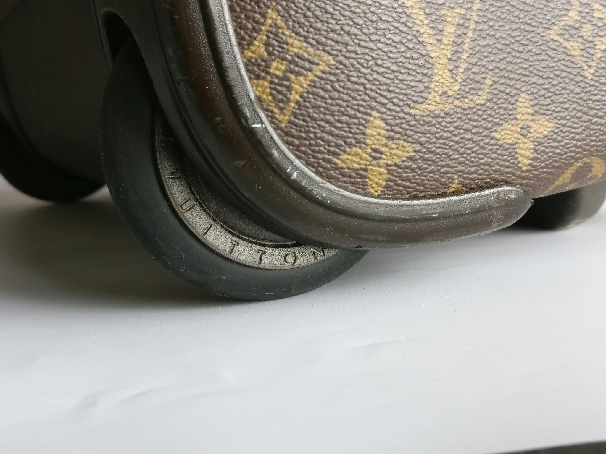 Louis Vuitton Pegase 55 with bag cover
