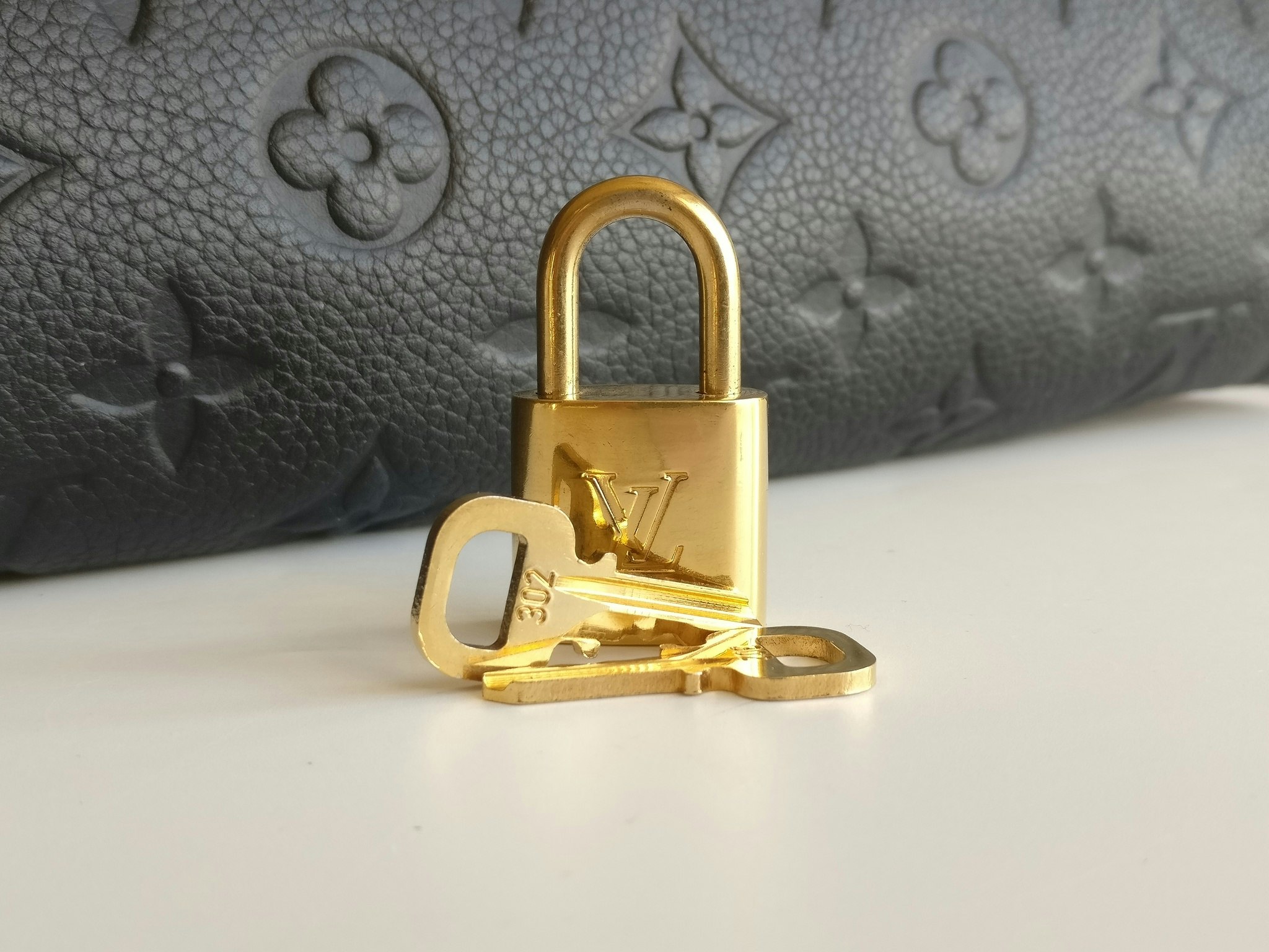 Louis Vuitton Lumineuse PM monogram empreinte