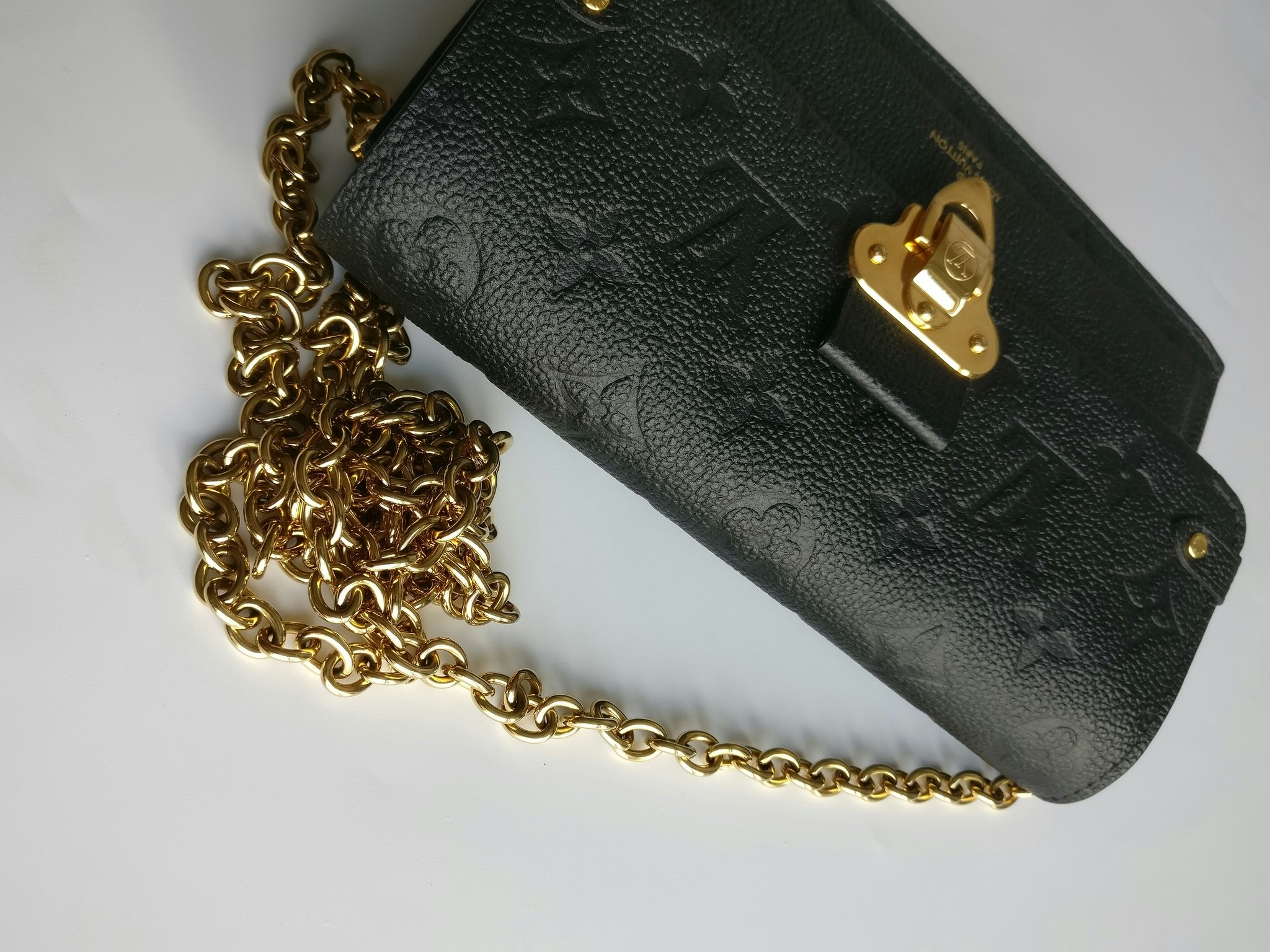 Louis Vuitton Vavin Chain Wallet empreinte