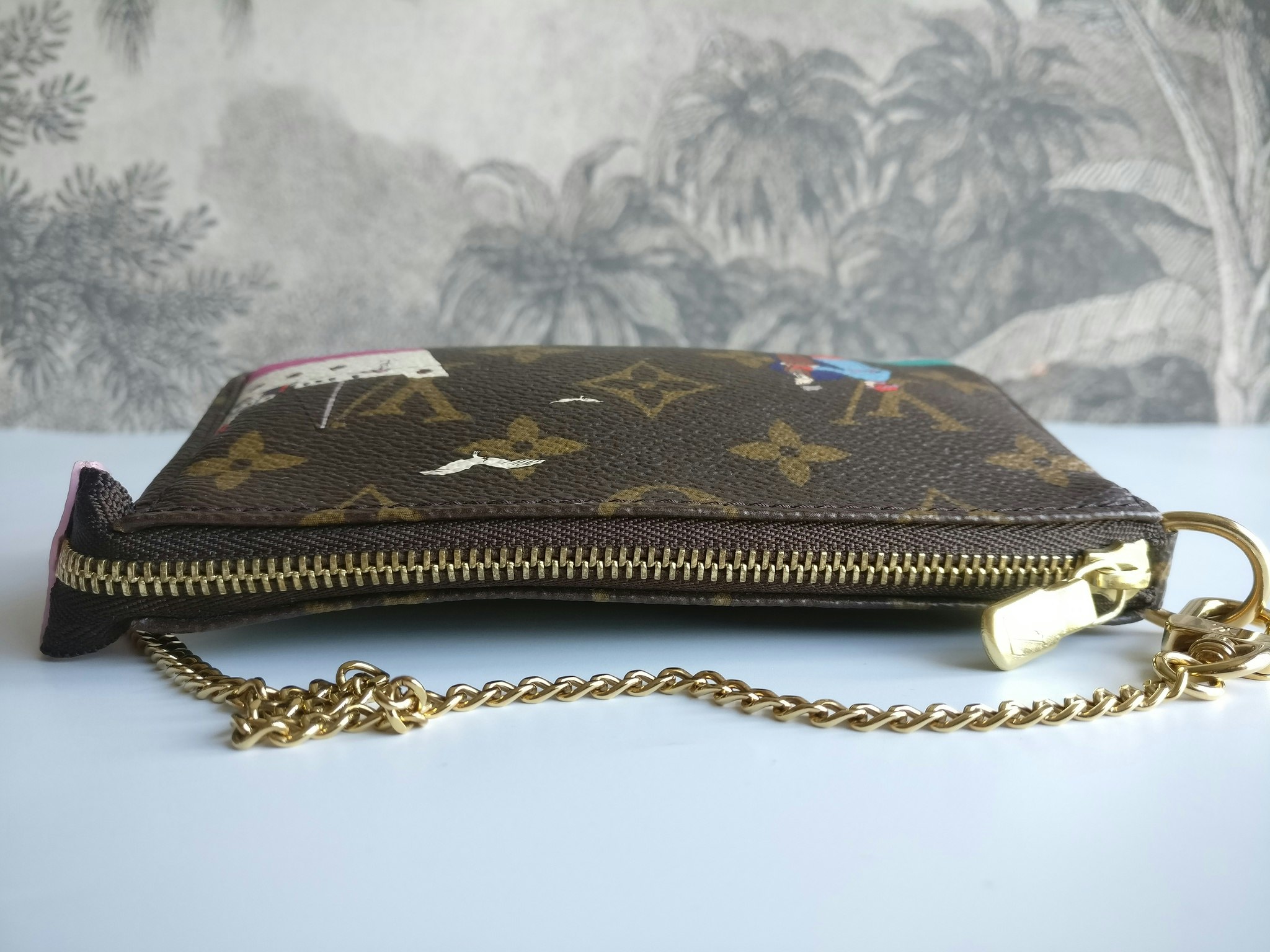 Louis Vuitton Mini Pochette Illustre