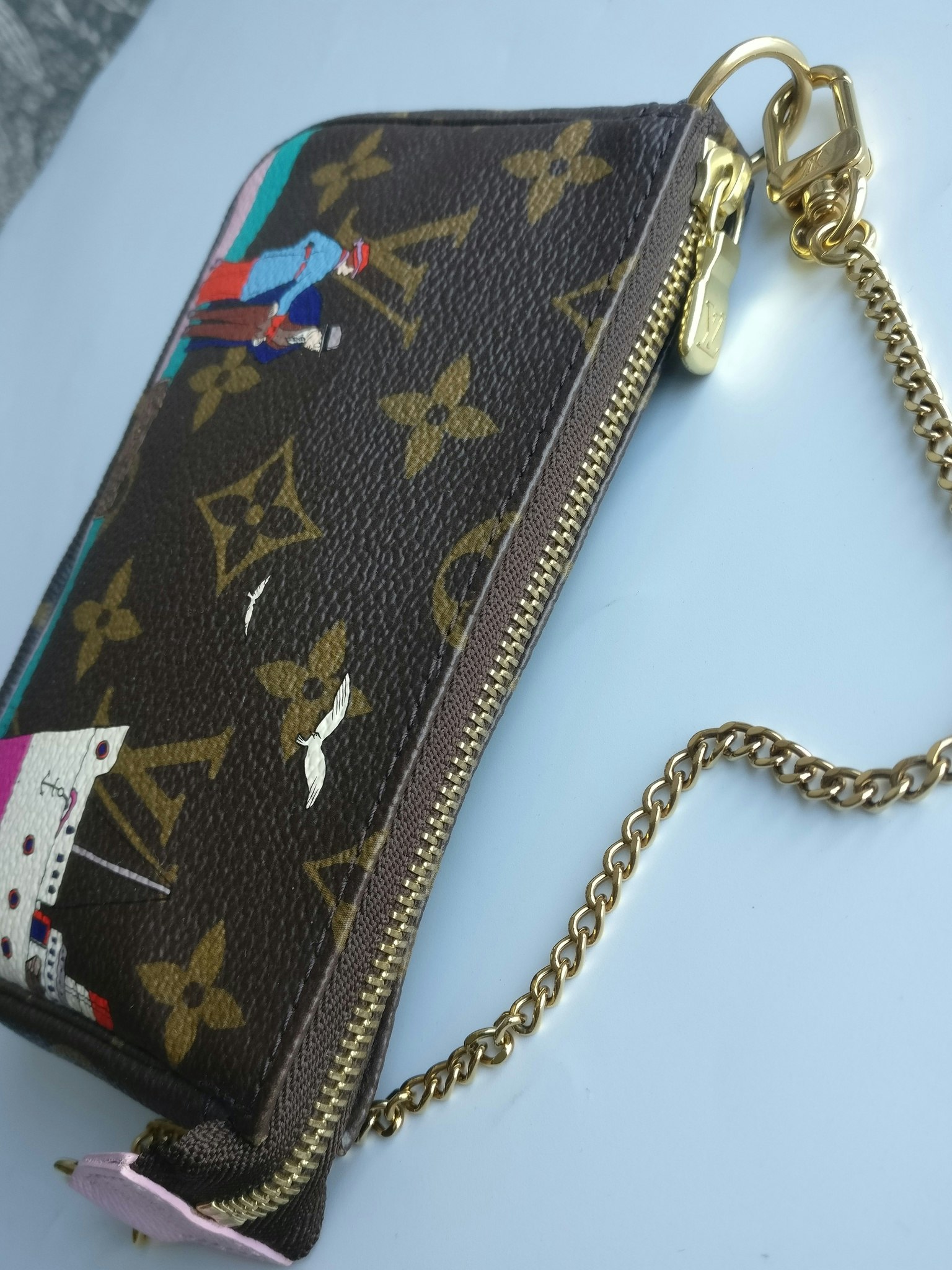 Louis Vuitton Mini Pochette Illustre