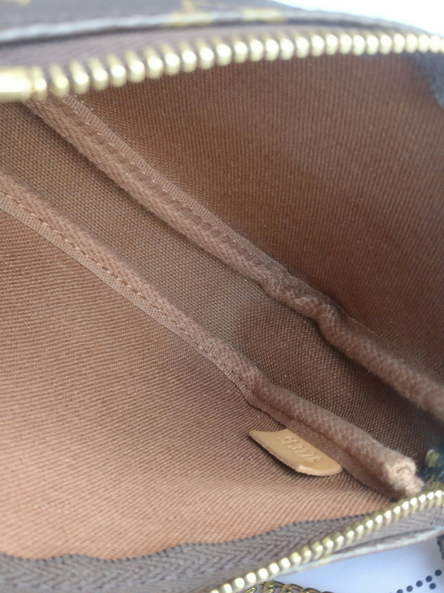 Louis Vuitton Mini Pochette Illustre