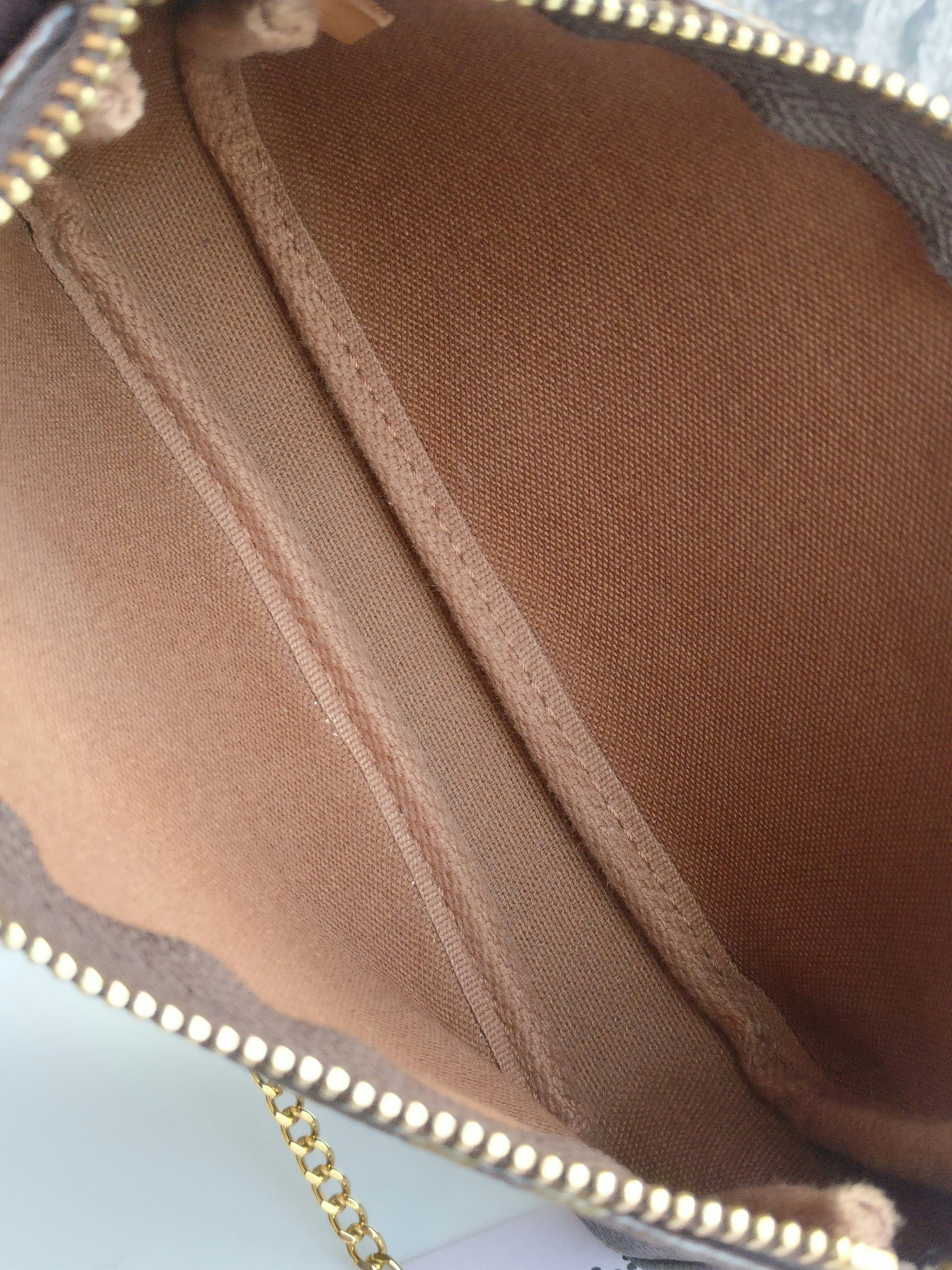 Louis Vuitton Mini Pochette Illustre