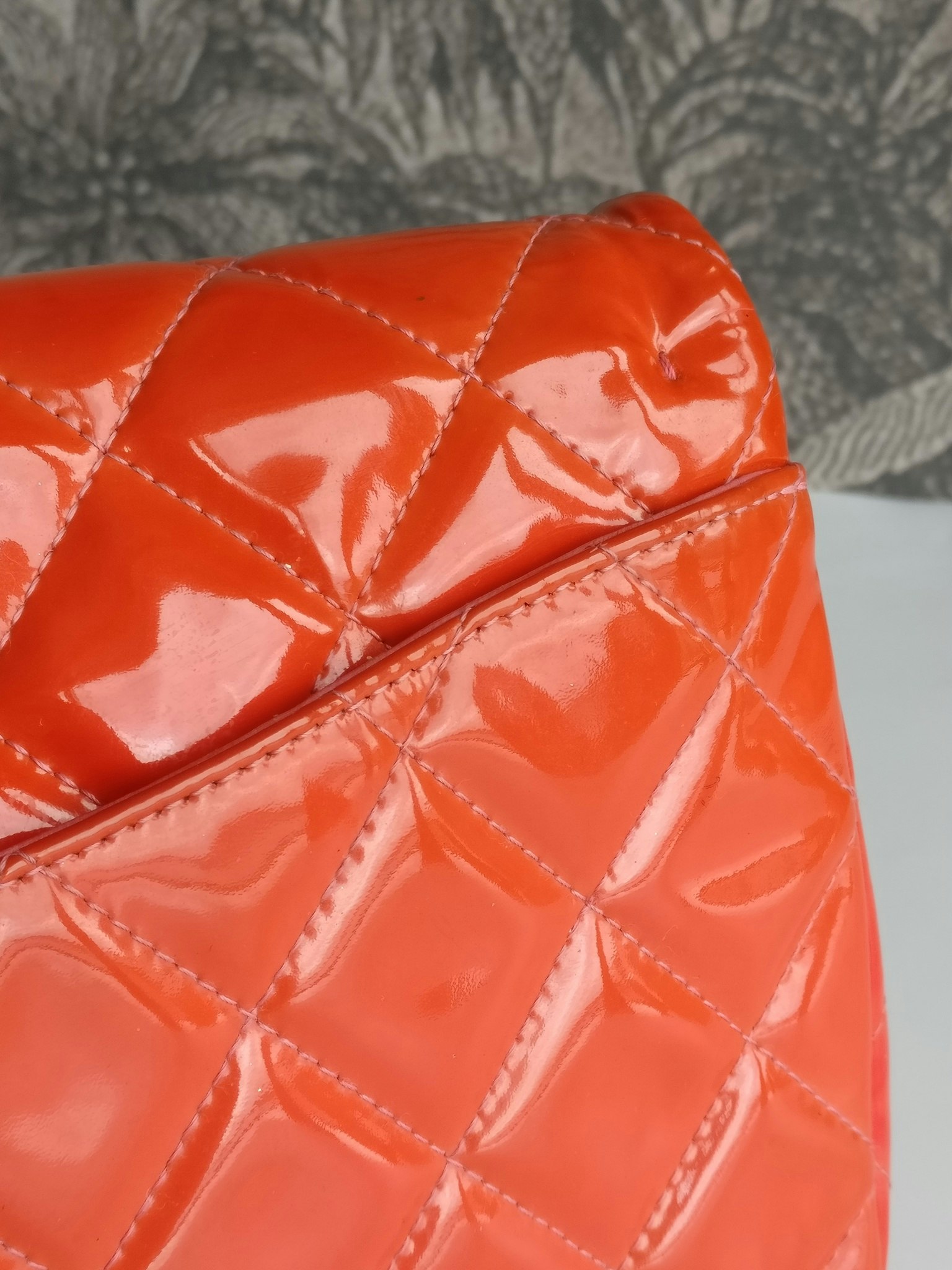 Chanel quilted red patent flap bag